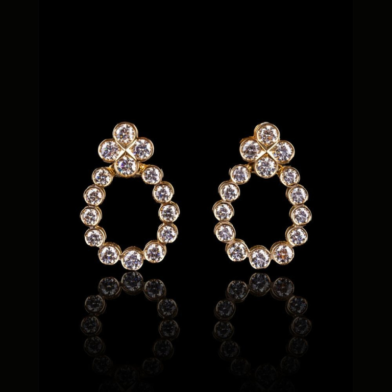 Arena, Gold and diamond earrings